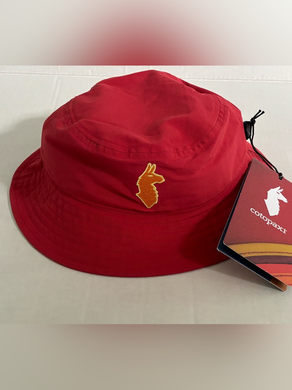 New! Cotopaxi Kids Bucket Hat Nylon Llama Logo Color Strawberry One Size